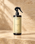 Black Orchid & Lily – Raum- & Textilspray, 500 ml auf warmem Naturstein